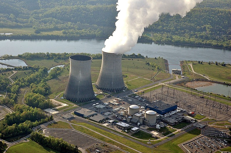 In this April 2007 file photo provided by the Tennessee Valley Authority, steam rises from the cooling tower of the single operating reactor at the Watts Bar Nuclear Plant in Spring City, Tenn. TVA soon will begin developing a new, 30-year plan for power generation that will rely less on coal and more on nuclear power.