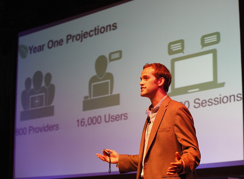 Harrison Tyner, CEO of Chattanooga health care technology startup WeCounsel, talks about the company's tele-counseling services during the Gig Tank Demo Day at the Chattanooga Theater Center in Chattanooga.