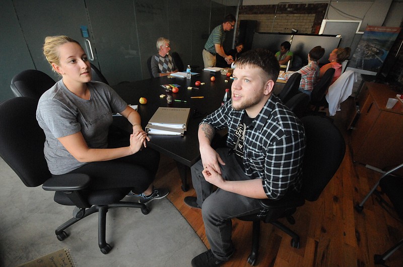 Co.Starters students Alex Jump, left, and David Wright talk about their dream of opening a ramen (noodle) restaurant prior to the start of their second week of class at the Co.Lab on East Main Street in this 2013 file photo.
