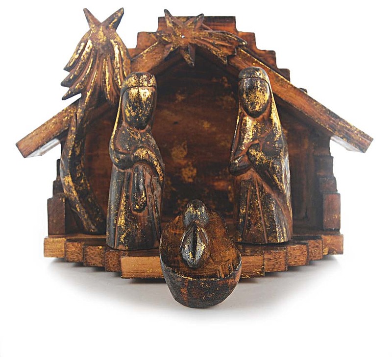 <strong>Fair Trade Nativity Scene</strong>
Available at Go Fish Clothing & Jewelry Co.
40 Frazier Ave.
423-756-8633
Hand crafted by a family in the region of Bali, this wooden sculpture puts a unique and rustic twist on the traditional manger scene. $39