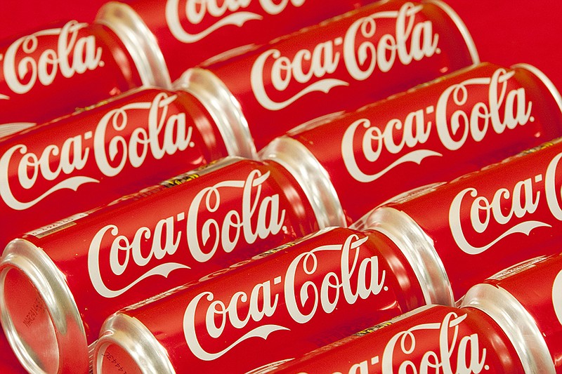 The Birmingham, Ala.-based Coca-Cola Bottling Company United may build a 290,000-square-foot distribution and sales facility at the former Olan Mills plant Highway 153.
