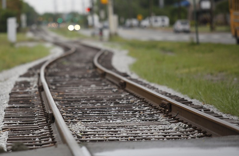 Staff file photo / Railroad tracks running parallel to Holtzclaw Avenue are part of the existing rail network Chattanooga is hoping to use in a light rail network that would connect downtown and urban neighborhoods to the airport and the Enterprise South industrial park.