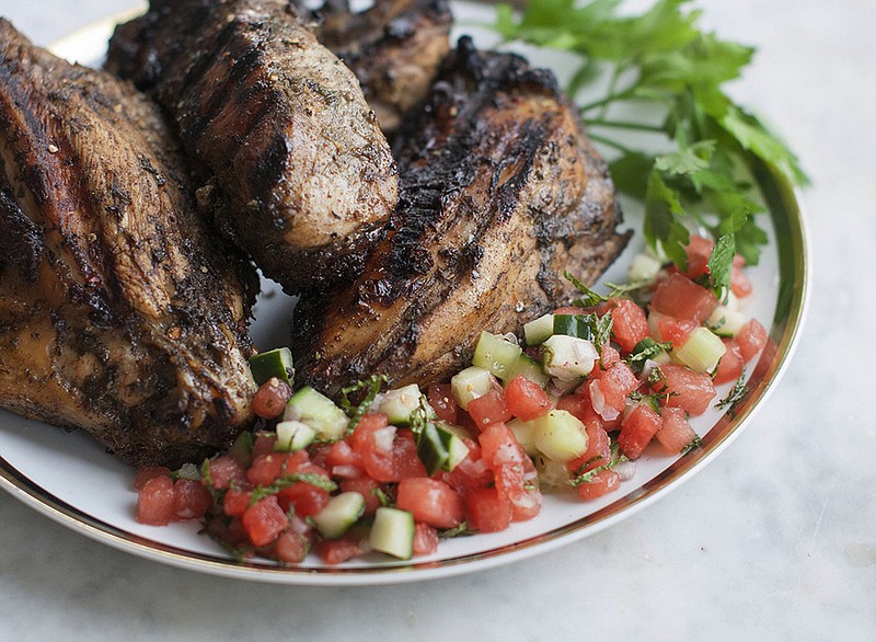 This grilled jerk chicken breast is paired with watermelon salsa. Jerk refers both to a unique blend of seasonings
and to a method of slow cooking.