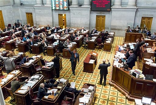 House members participate in a floor debate at the state Capitol in Nashville on in this  April 15, 2014, photo.