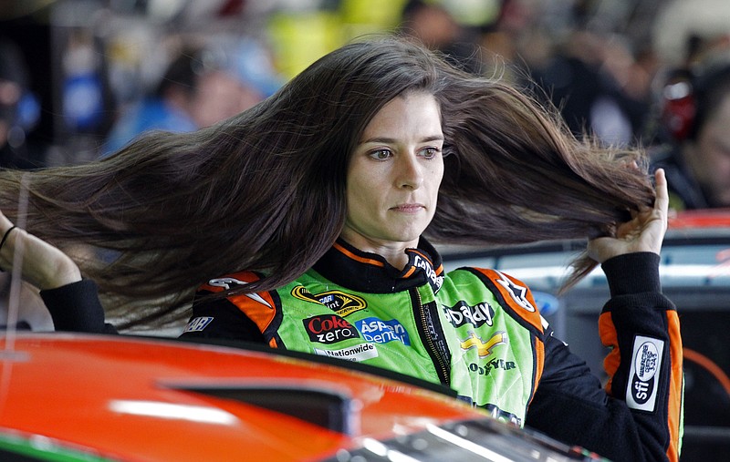 Driver Danica Patrick prepares before practice for tonight's NASCAR Sprint Cup series auto race at Charlotte Motor Speedway in Concord, N.C., Friday, May 16, 2014.