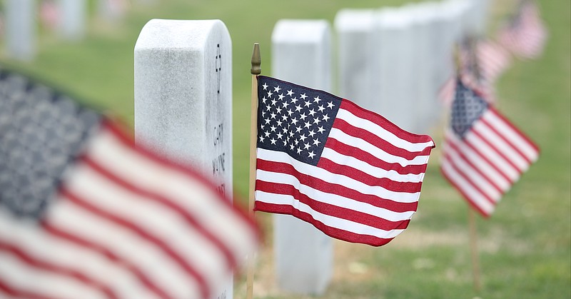 A flag is in front of each headstone at the Chattanooga National Cemetery.