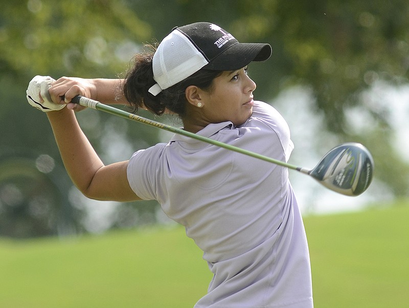 Emily Javadi tees off as she participates in the 75th annual Chattanooga Women's Golf Association Championship in 2012 at the Chattanooga Golf and Country Club.