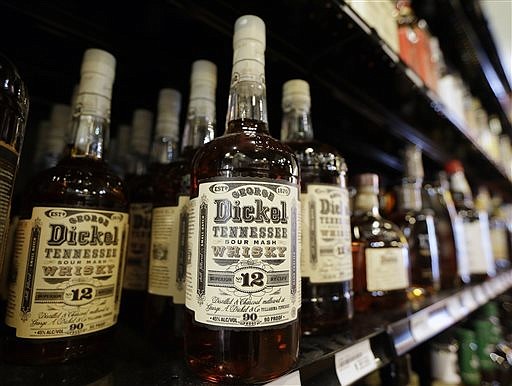 Bottles of George Dickel Tennessee whiskey are displayed in a liquor store Tuesday, June 10, 2014, in Nashville.