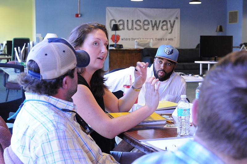 Causeway Executive Director Abby Garrison welcomes class members to a class designed  to assist participants in launching ideas to better the community. James Chapman, right, is an entrepreneur in residence in this file photo.