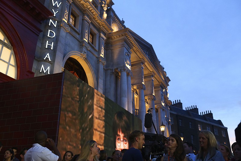 
              The new London Embankment section is revealed during the Wizarding World of Harry Potter Diagon Alley preview event at Universal Studios Florida in Orlando on Wednesday, June 18, 2014. Diagon Alley will officially open to the public on July 8, 2014.  (AP Photo/The Tampa Bay Times, Eve Edelheit)
            