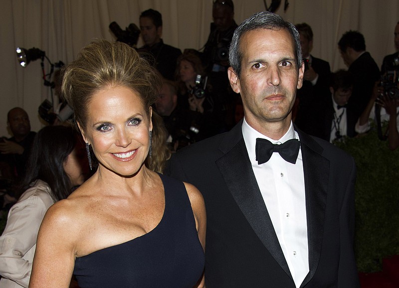 
              FILE - In this May 6, 2013, file photo, TV personality Katie Couric, left, and John Molner attend The Metropolitan Museum of Art's Costume Institute benefit celebrating "PUNK: Chaos to Couture" in New York. Couric has married Molner in a small ceremony at her East Hampton home. People magazine reports the former “Today” host and Molner took the vows on Saturday, June 21, 2014, in front of 50 guests. (Photo by Charles Sykes/Invision/AP, File)
            