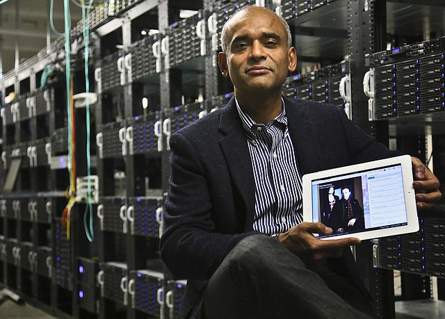
              FILE - This Dec. 20, 2012 file photo shows Chet Kanojia, founder and CEO of Aereo, Inc., holding a tablet displaying his company's technology, in New York.  The Supreme Court has ruled that a startup Internet company has to pay broadcasters when it takes television programs from the airwaves and allows subscribers to watch them on smartphones and other portable devices. The justices said Wednesday by a 6-3 vote that Aereo Inc. is violating the broadcasters' copyrights by taking the signals for free. The ruling preserves the ability of the television networks to collect huge fees from cable and satellite systems that transmit their programming. (AP Photo/Bebeto Matthews, File)
            