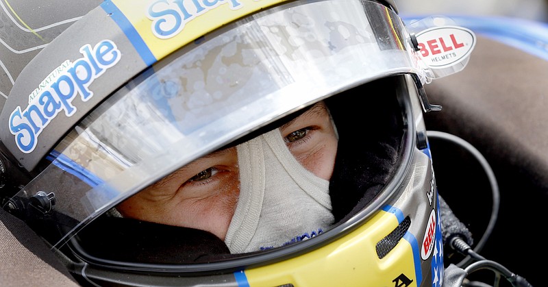 
              Marco Andretti waits for the start of a practice session for the IndyCar Grand Prix of Houston auto race Friday, June 27, 2014, in Houston. (AP Photo/David J. Phillip)
            