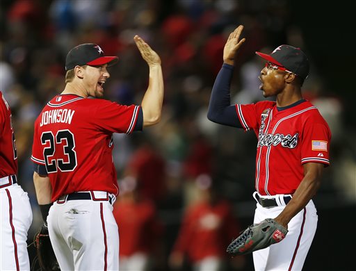 B. J. Upton and Chris Johnson of the Atlanta Braves celebrate after News  Photo - Getty Images