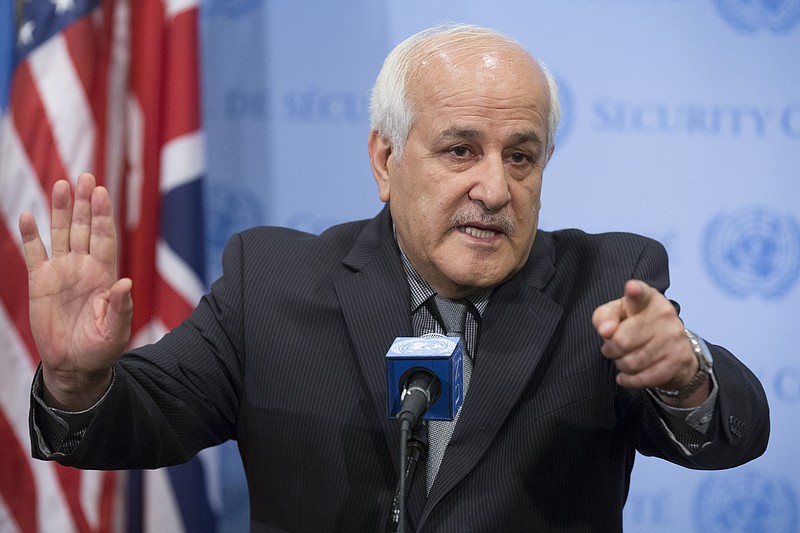 
              Palestinian U.N. Ambassador Riyad Mansour speaks during an emergency meeting of the U.N. Security Council on the worsening situation in Gaza at United Nations headquarters, Sunday, July 20, 2014. A Jordan-drafted resolution obtained by The Associated Press expresses "grave concern" at the high number of civilians killed in Gaza, including children, and it calls for an immediate cease-fire, "including the withdrawal of Israeli occupying forces from the Gaza Strip." (AP Photo/John Minchillo)
            