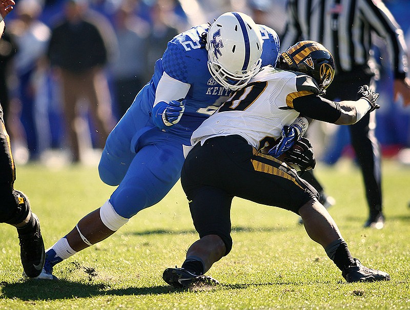 Kentucky's Alvin Dupree moves in for a tackle against Missouri in this file photo.