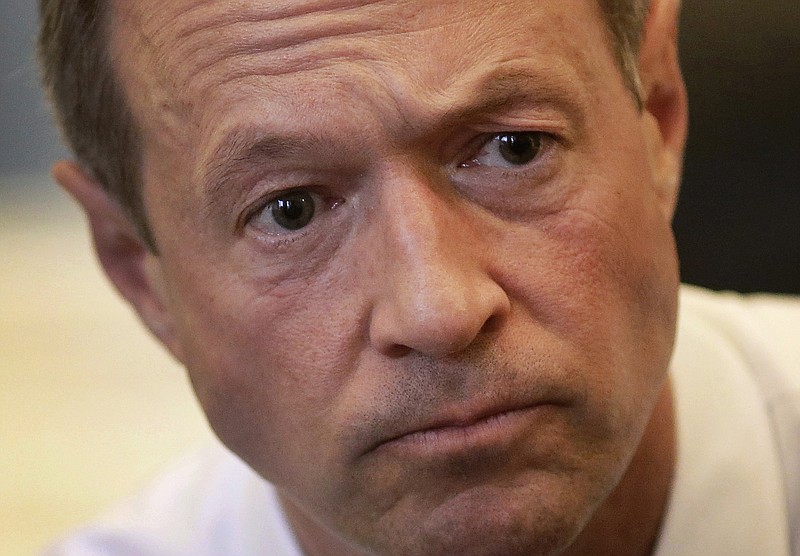 
              FILE - Maryland Gov. Martin O'Malley speaks with reporters in his office inside the Maryland State House in Annapolis, Md., in this April 7, 2014 file photo. O'Malley was returning to Iowa on Saturday, July 26, 2014 headlining a fundraiser for state Sen. Rita Hart in Clinton, a town on the banks of the Mississippi River, and another event in North Liberty for Kevin Kinney, a Johnson County sheriff's deputy seeking an open state Senate seat. After a Saturday night speech in Omaha to help the Nebraska Democratic Party, O’Malley was joining with Democratic gubernatorial candidate Jack Hatch, who is challenging Republican Gov. Terry Branstad, for fundraisers in western Iowa on Sunday and a canvassing kickoff in Sioux City. (AP Photo/Patrick Semansky, File)
            