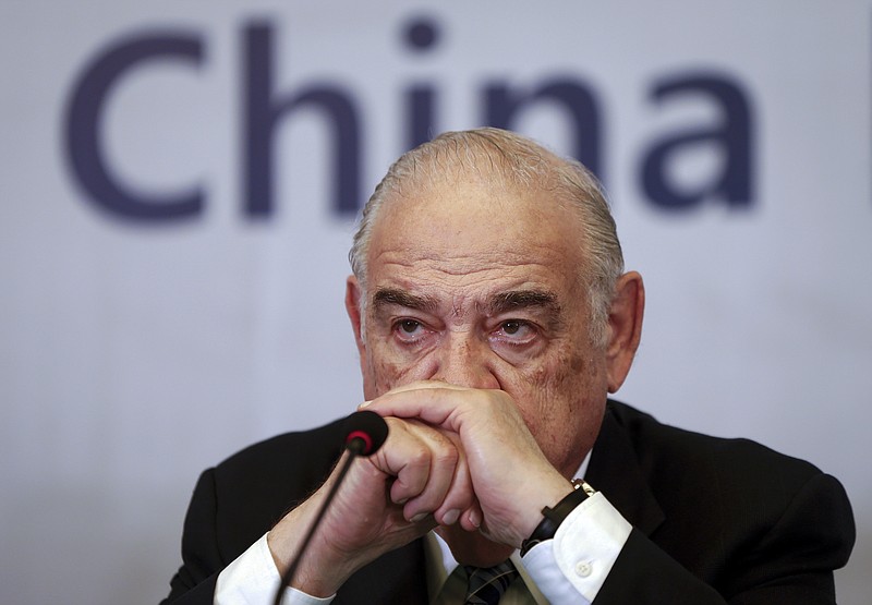 
              CEO of the Illinois-based OSI Group Sheldon Levin, reacts as he attends a news conference following a meat safety scandal, in Shanghai, China Monday, July 28, 2014. A U.S. meat supplier says a Chinese unit embroiled in a safety scandal has fallen short of its requirements for maintaining high standards. (AP Photo) CHINA OUT
            