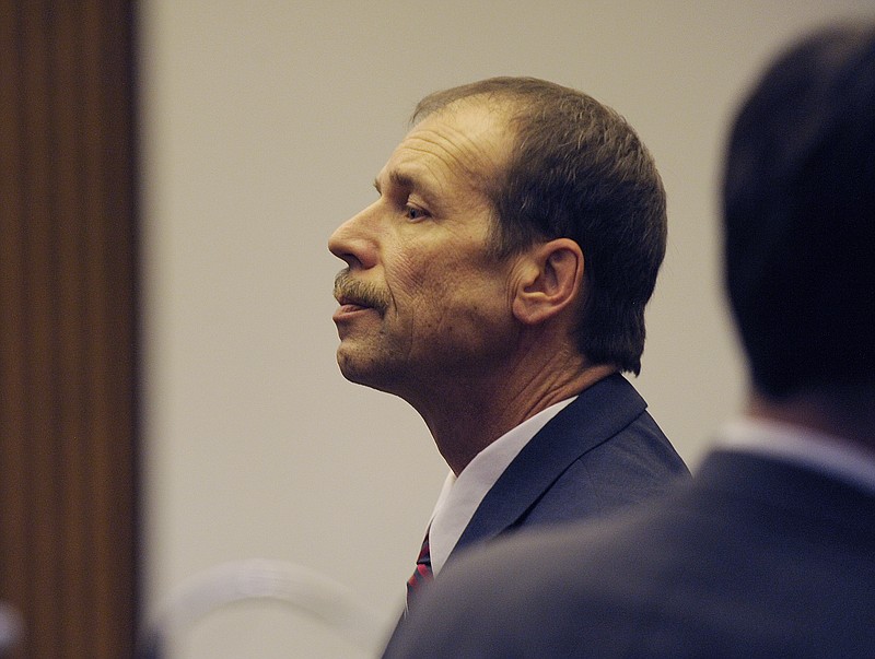 
              Theodore Wafer pauses at the end of Day 3 of his trial, Monday, July 28, 2014, Detroit, Mich. Wafer is the Dearborn Heights homeowner charged in the shooting death of Renisha McBride. (AP Photo/The Detroit News, Clarence Tabb Jr.)
            