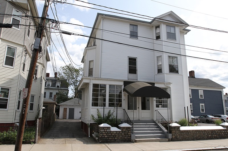 
              This Wednesday, July 30, 2014 photo shows Pennine Funeral Home, on Grove Street, in Providence, R.I., where bodies and remains that had been stored for up to a decade or more, were found a week earlier. The funeral home's director, Alfred Pennine, committed suicide July 21 in New Hampshire, according to authorities. (AP Photo/Providence Journal, Steve Szydlowski) NO SALES; RHODE ISLAND OUT
            