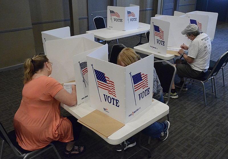 Voters mark their ballots on Aug. 7, 2014, at St. Mark's United Methodist Church in Chattanooga.