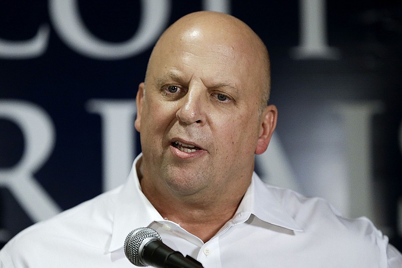Rep. Scott DesJarlais, R-Tenn., speaks to supporters after he was declared the winner of Tennessee's 4th Congressional District Republican primary race Thursday, Aug. 7, 2014, in South Pittsburg, Tenn.
