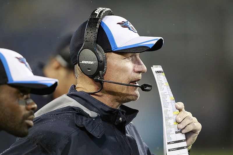 
              Tennessee Titans head coach Ken Whisenhunt watches the action against the Green Bay Packers during his first game as the Titans' head coach in the fourth quarter of a preseason NFL football game Saturday, Aug. 9, 2014, in Nashville, Tenn. (AP Photo/Wade Payne)
            