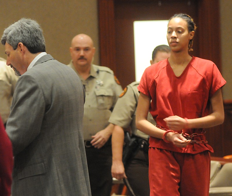 Slaying suspect Skyy Mims approaches the podium in a Whitfield County court Monday afternoon.