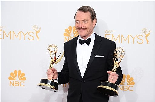 Bryan Cranston, winner of the award for outstanding lead actor in a drama series for his work in "Breaking Bad," smiles for the cameras in the press room at the 66th Annual Primetime Emmy Awards at the Nokia Theatre L.A. Live on Monday, Aug. 25, 2014, in Los Angeles.