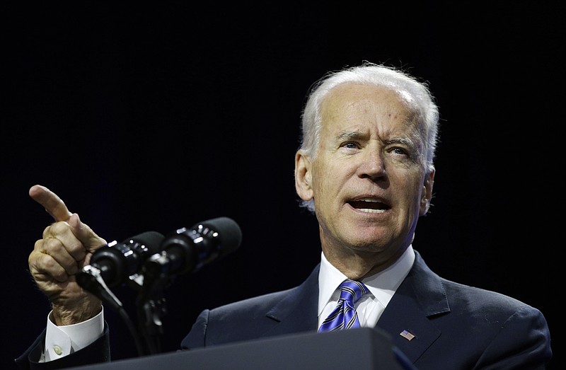 
              FILE - In this Wednesday, July 23, 2014 file photo, Vice President Joe Biden speaks on voting rights at the NAACP annual convention in Las Vegas. Vice President Joe Biden is going to get a firsthand look at work done at the Portsmouth Naval Shipyard before another possible round of base closings, Tuesday, Sept. 2, 2014 (AP Photo/John Locher, File)
            