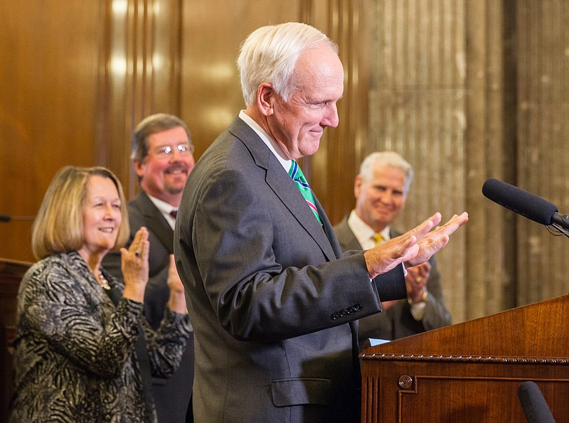 Herbert Slatery gestures to supporters after his appointment as attorney general in the Tennessee Supreme Court chamber in Nashville.