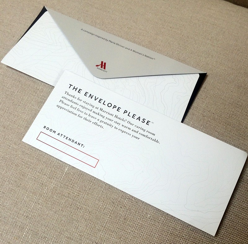 
              This photo provided by A Woman’s Nation shows an envelope that Marriott will be placing in 160,000 hotel rooms in the U.S. and Canada beginning this week to encourage guests to leave a tip for the person who cleans the room. The envelopes bear the name of the room attendant. Marriott is launching the project with Maria Shriver, founder of A Woman’s Nation, an organization that works on issues empowering women. Shriver says many travelers don’t realize that it’s customary to leave a tip for the person who cleans your hotel room. (AP Photo/A Woman’s Nation)
            