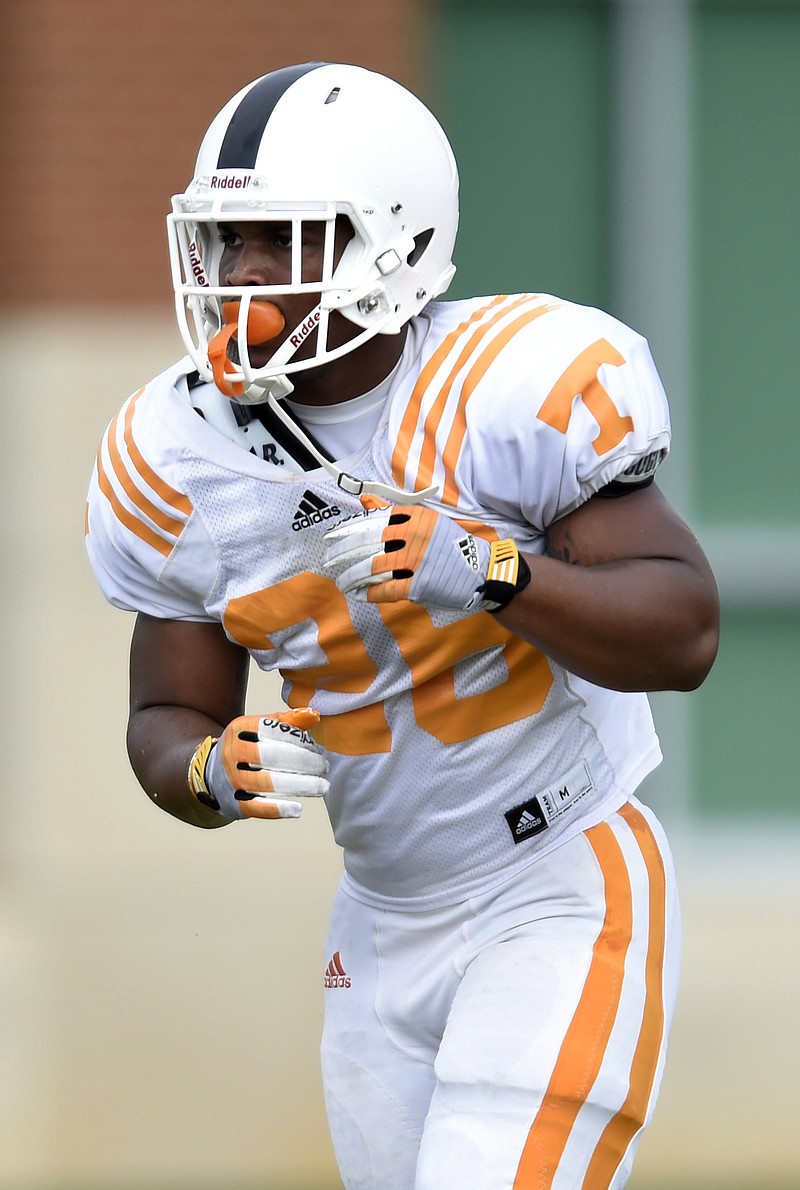 In this Friday, Aug. 8, 2014 file photo, Tennessee running back Treyvon Paulk practices in Knoxville, Tenn. Tennessee has dismissed running back Treyvon Paulk from the team following a police report that he hit a woman in the mouth at a party.