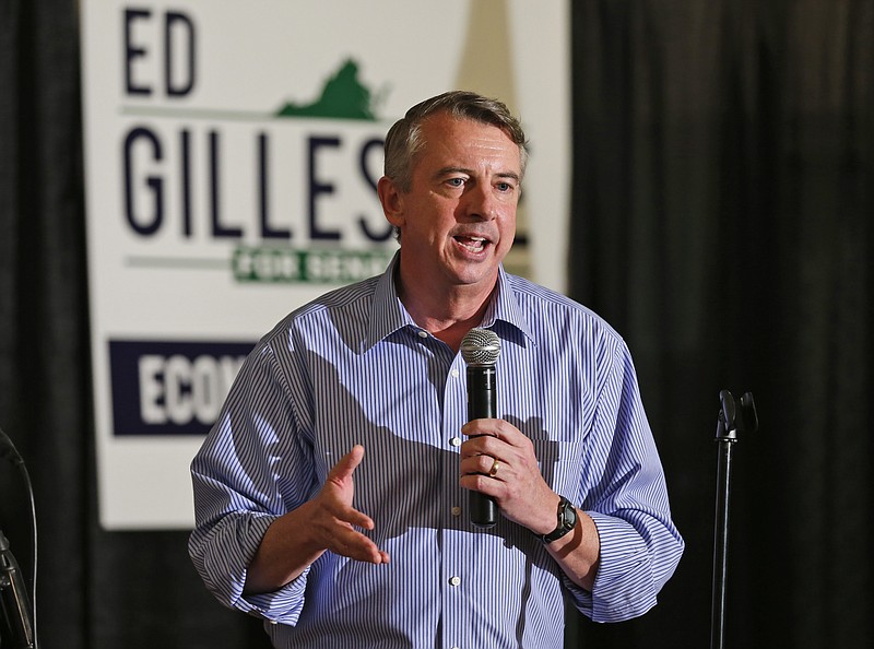 
              FILE - This Wednesday Oct. 15, 2014 file photo Republican U.S. Senate candidate, Ed Gillespie speaks during a rally in Ashland, Va.  Gillespie is ditching television ads in the state with less than three weeks before he faces US Sen. Mark Warner, D-Va., on Election Day. (AP Photo/Steve Helber)
            