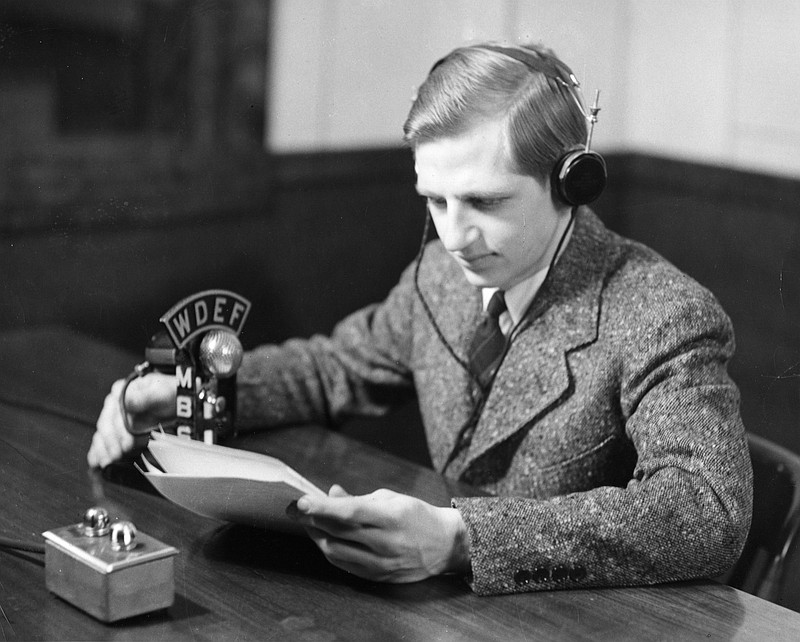 Luther Masingill poses for a WDEF photograph in his job as a staff announcer for the radio station shortly after he returned to Chattanooga from military service in World War II. As a fledgling radio announcer, Masingill read incoming news accounts to Chattanoogans of the Dec. 7, 1941, attacks on Pearl Harbor.