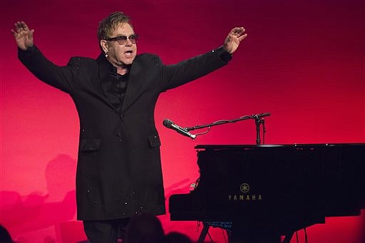 Elton John performs at the Elton John AIDS Foundation's 13th Annual "An Enduring Vision" benefit at Cipriani's Wall Street on  Oct. 28, 2014, in New York.