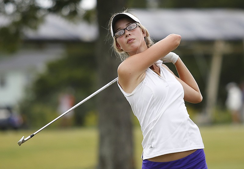 UTC golfer Emily McLennan practices Tuesday, Sept. 9, 2014, at First Tee Practice Facility in Chattanooga.