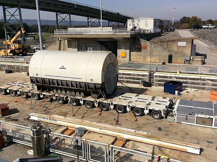 Barge carrrying a 200-ton generator stator is the first to "lock through" the recently repaired Chickamauga Lock. The stator is on its way to the Kingston Fossil Plant in Roane Co. on the Clinch River. Repairs to the lock in Chattanooga were completed ahead of schedule today.