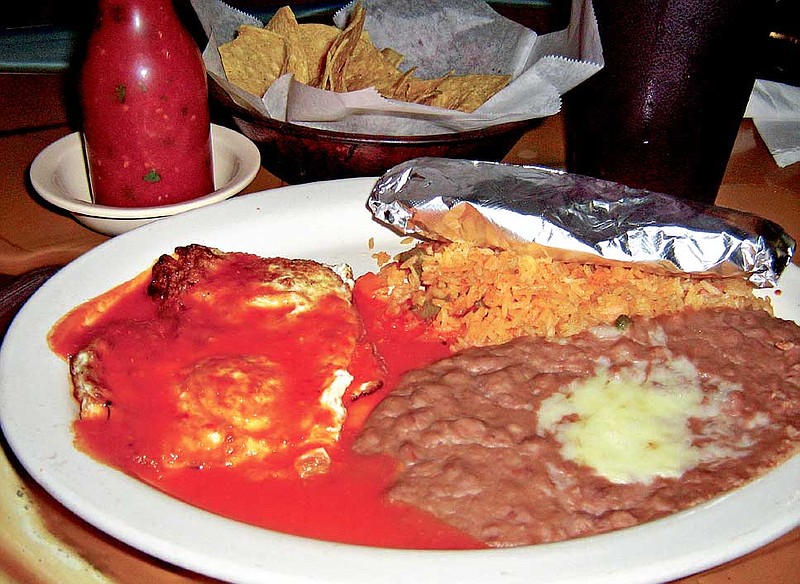 At Cancun Mexican Restaurant on Broad Street, Huevos Rancheros comes with poached eggs (huevos), left, in a red-hot ranchero sauce and beans, rice and warm tortillas.