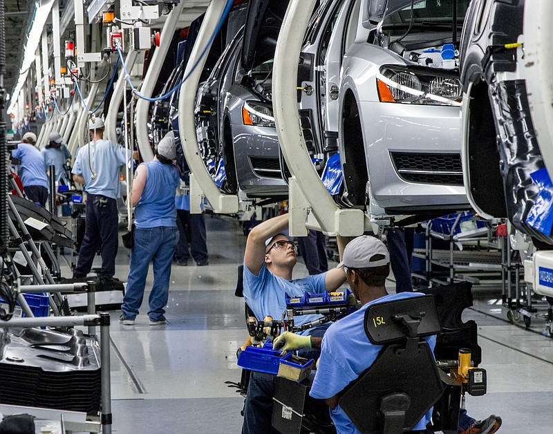 Workers assemble Volkswagen Passat sedans at the German automaker's plant in Chattanooga in this file photo.
