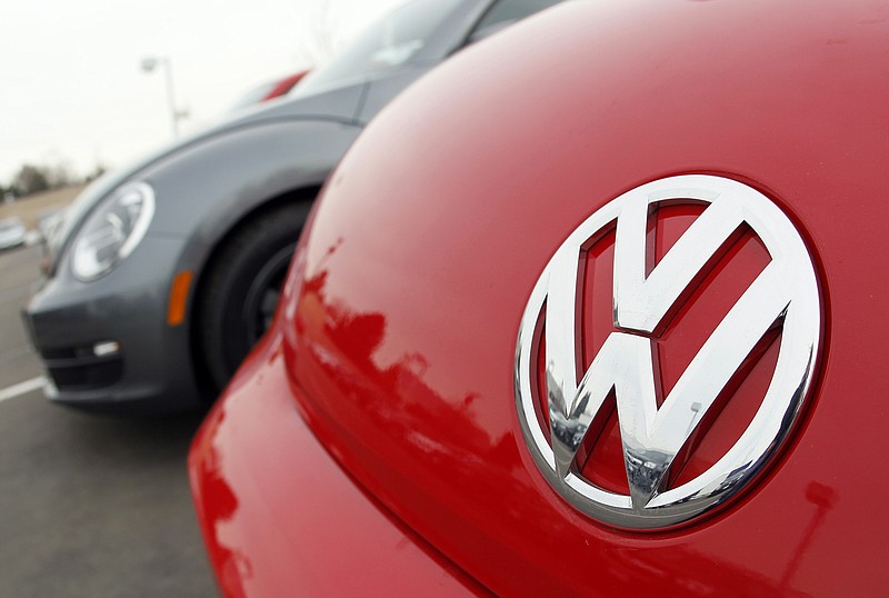 
              FILE - This Feb, 19, 2012 file photo shows the Volkswagen logo on the hood of a 2012 Beetle at a Volkswagen dealership in the south Denver suburb of Littleton, Colo. Volkswagen on Wednesday, Nov. 19, 2014 announced it is recalling 442,000 Jettas and Beetles to fix a problem that can cause rear suspension failure if the cars aren't fixed properly after a crash. The recall covers 2011 through 2013 Jettas and 2012 through 2013 Beetles. (AP Photo/David Zalubowski, File)
            