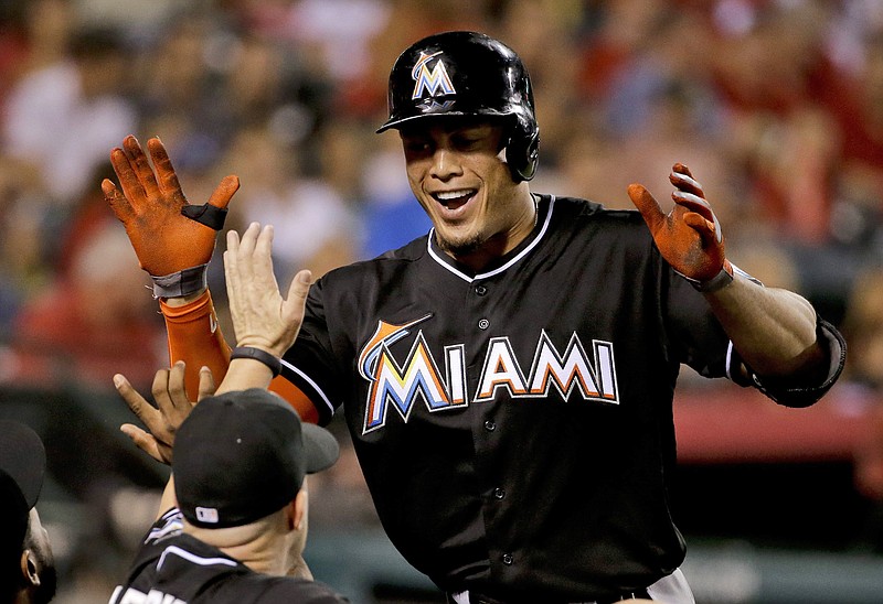 Giancarlo Stanton signs record $325m deal with Marlins - The