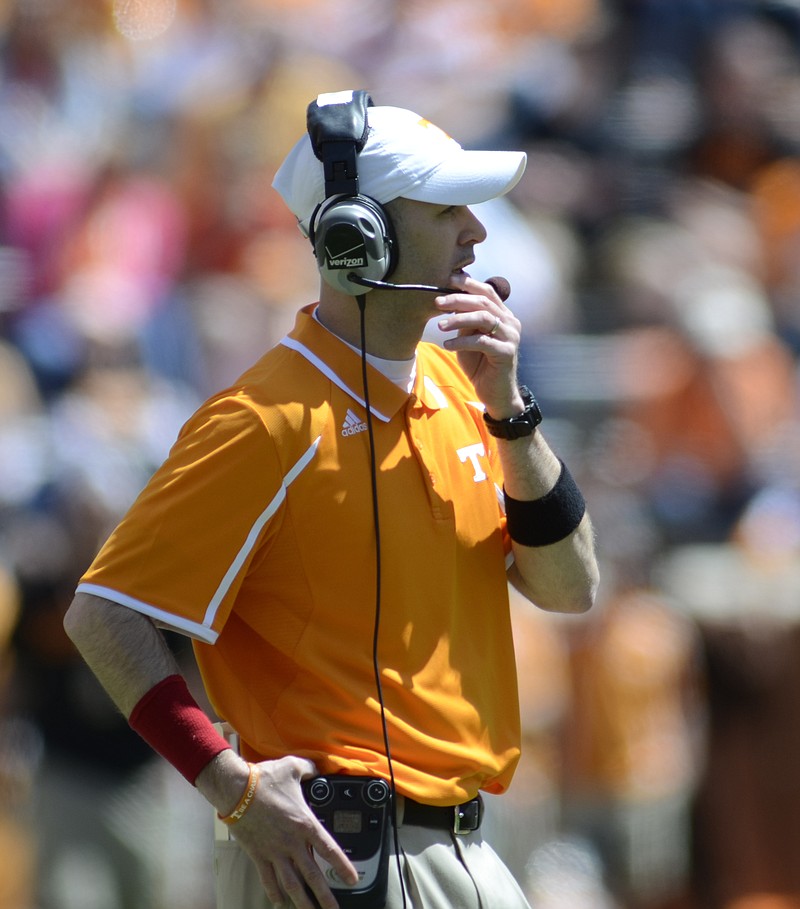 Receivers coach Zach Azzanni watches the Orange and White game at Neyland Stadium in this file photo.