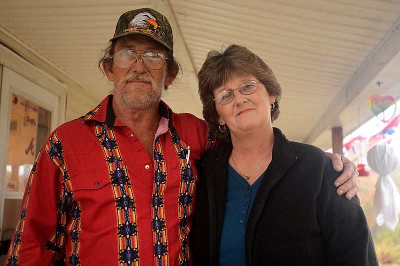 
              In a Nov. 5, 2014 photo, Donald Moore and Donna Brunty, who are brother and sister, pose for a photo in Jackson, Tenn. Mooore and Brunty have recently reunited after 51 years of being apart. (AP Photo/The Jackson Sun, Ken Cummings) NO SALES
            