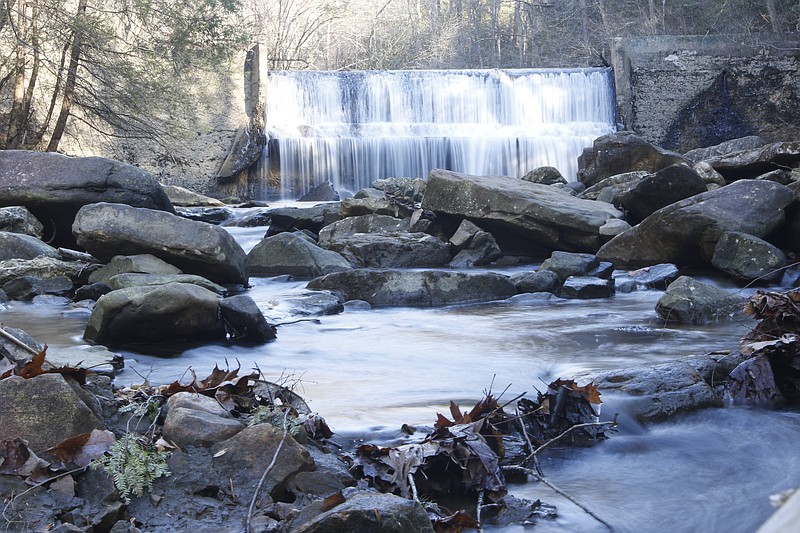 The falls over the dam at Rainbow Lake are seen on Friday in Signal Mountain. The Land Trust for Tennessee is helping the town of Signal Mountain to permanently protect 342 acres in the town as public park space.