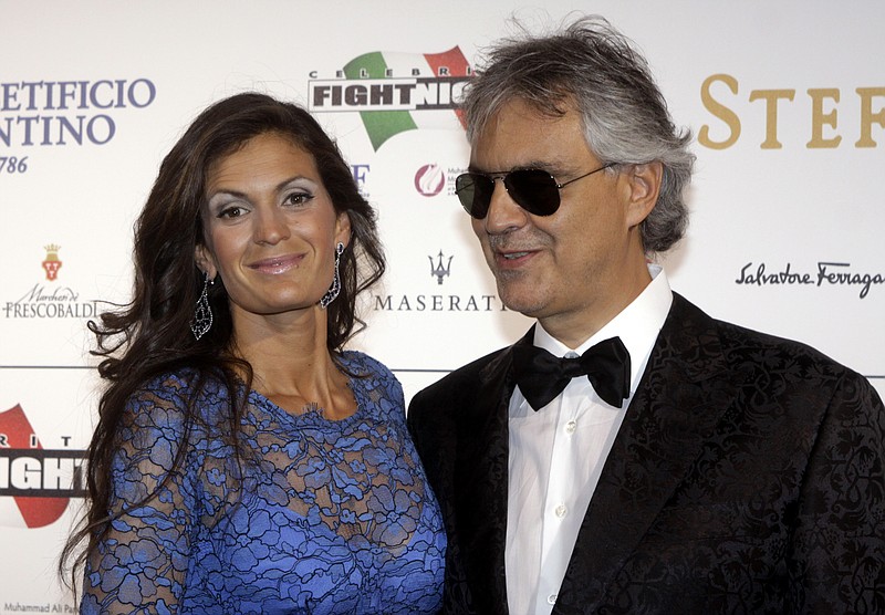 Singer Andrea Bocelli, third from left, his wife Veronica Berti