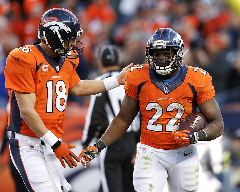 Denver Broncos running back C.J. Anderson celebrates winning the