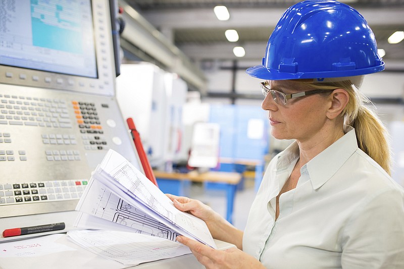 A worker programs a computerized machine in this file photo. Georgia Gov. Nathan Deal plans a variety of projects to improve the skills of the state's workers after industry leaders complained they often can't find qualified employees.