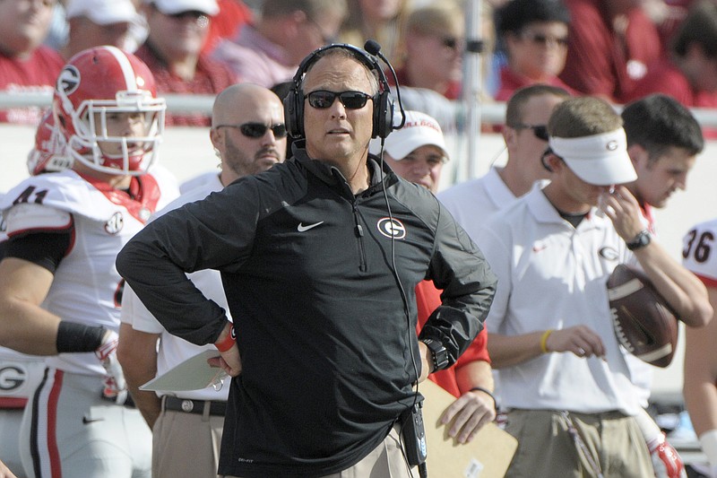 Georgia coach Mark Richt watches during the first half of the game against Arkansas in Little Rock, Ark., Saturday, Oct. 18, 2014.