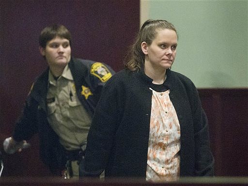 Wendy Wood Holland, 35, appears in the Baldwin County Circuit Court Wednesday, Dec. 10, 2014, in Bay Minette, Ala. 